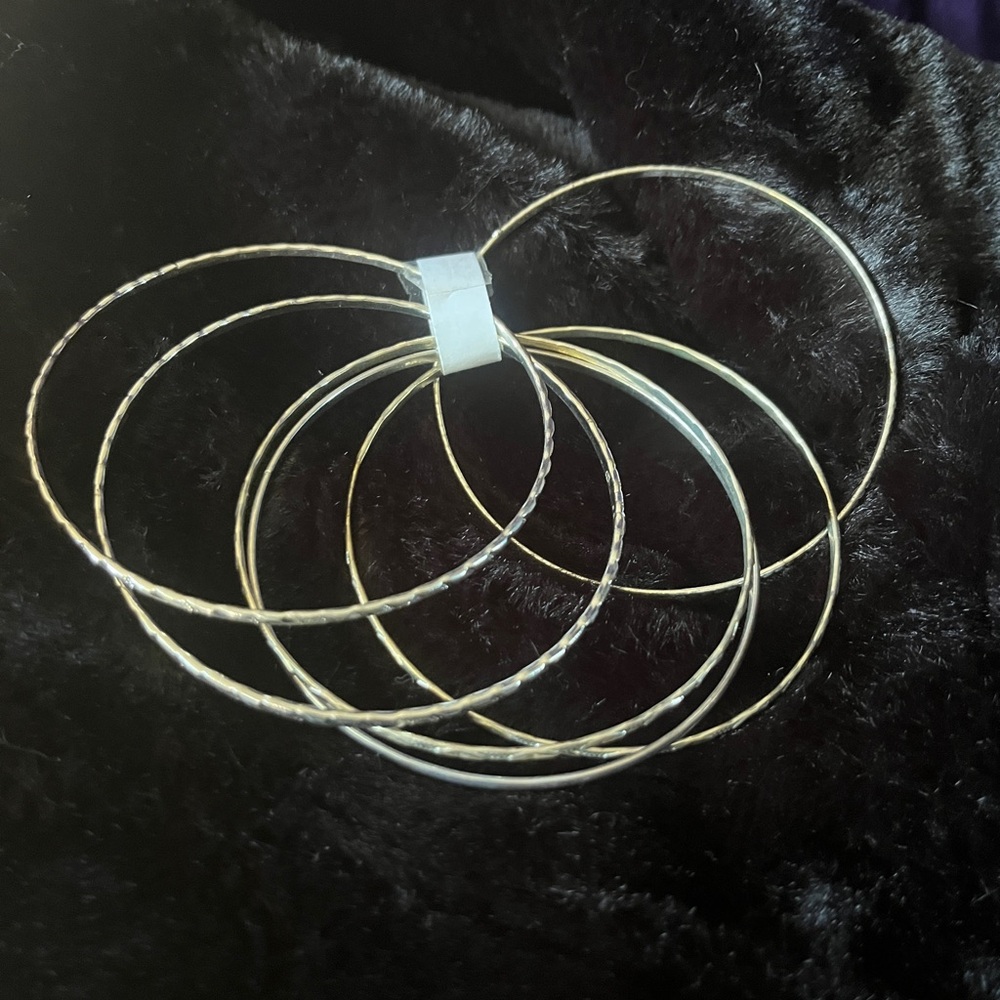 Set of six silver-tone bangle bracelets